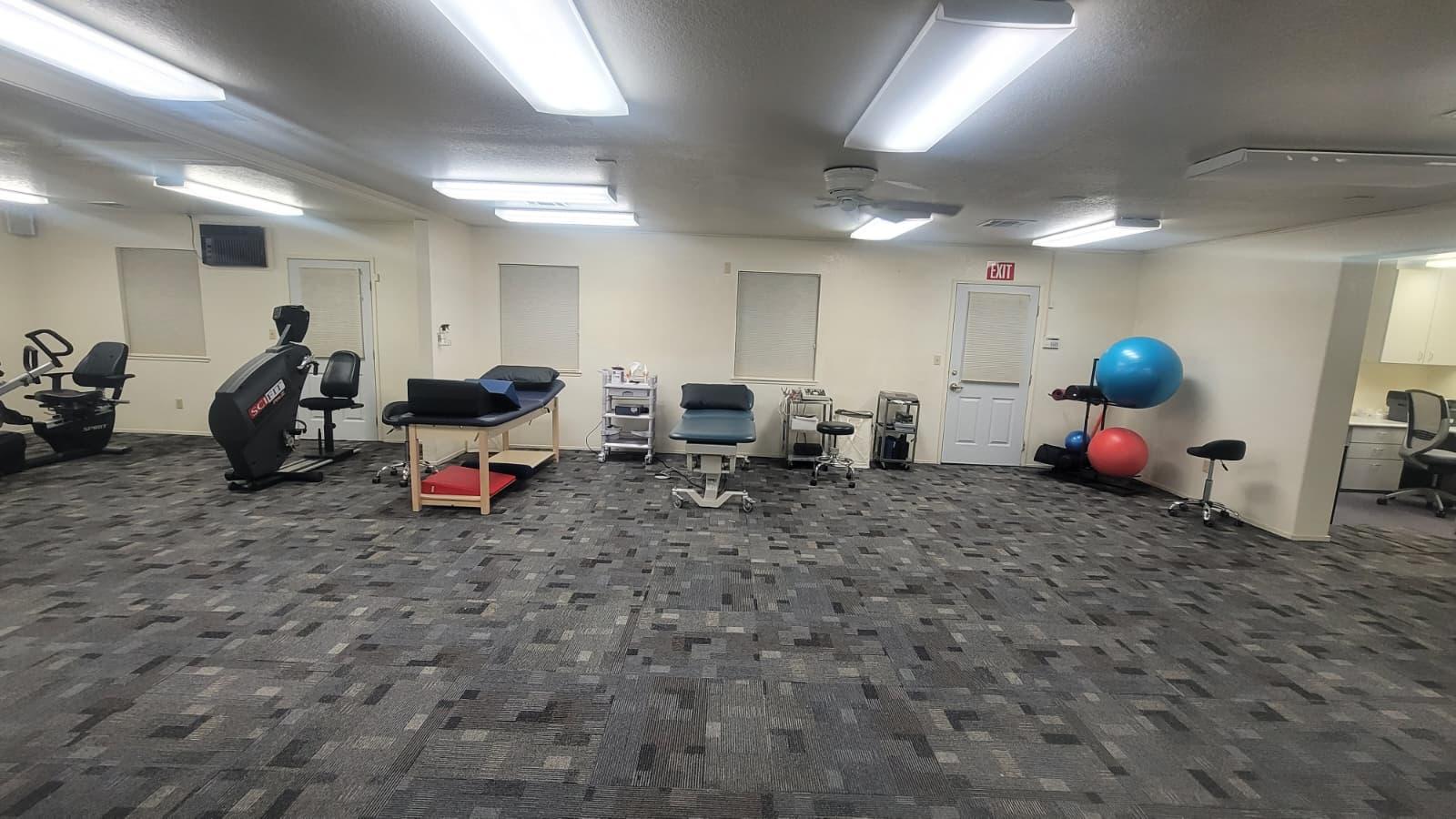 Physical therapist working with a patient at Team Rehab