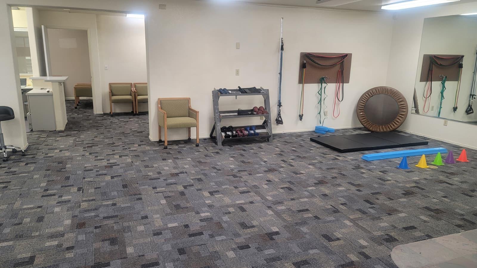 Patient working with state-of-the-art rehabilitation equipment